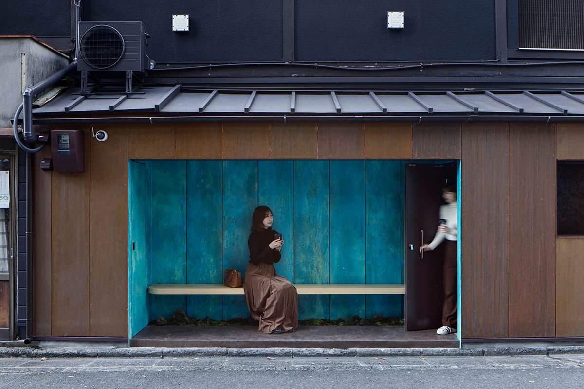 The one-meter-deep cafe invites customers with its patina color on its facade in Kyoto