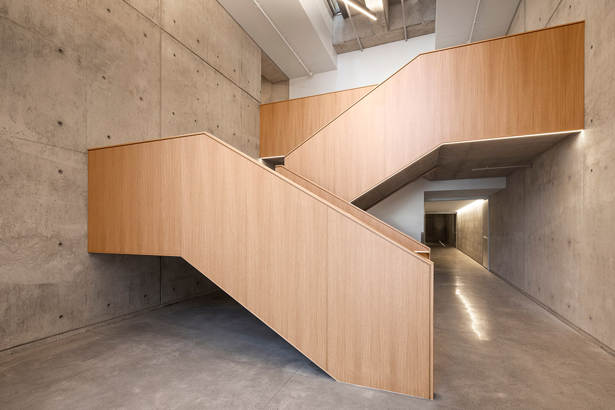 A striking bell tower pierces the sky, illuminating the grandeur of the pavilion in Montreal