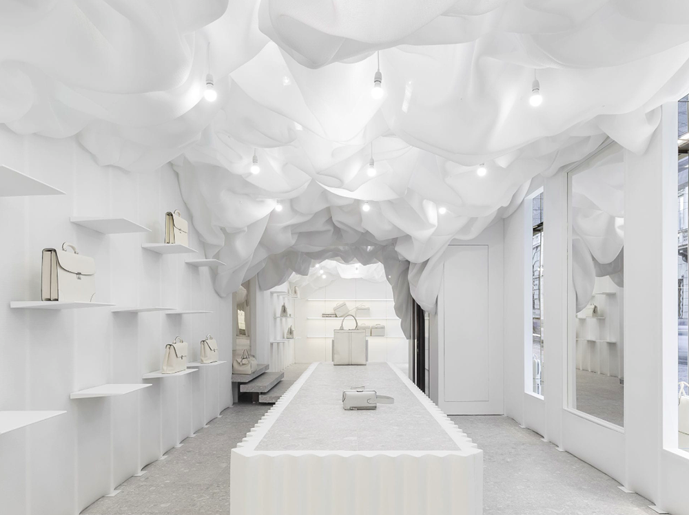 Snarkitecture created pop-up clouded-fabric for Valextra’s store in Milan