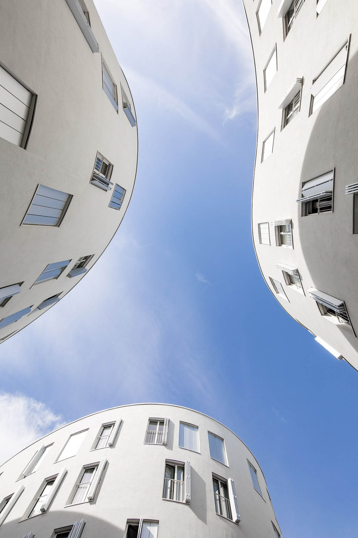 SANAA's social housing complex composed of organic forms in Paris photographed by Vincent Hecht
