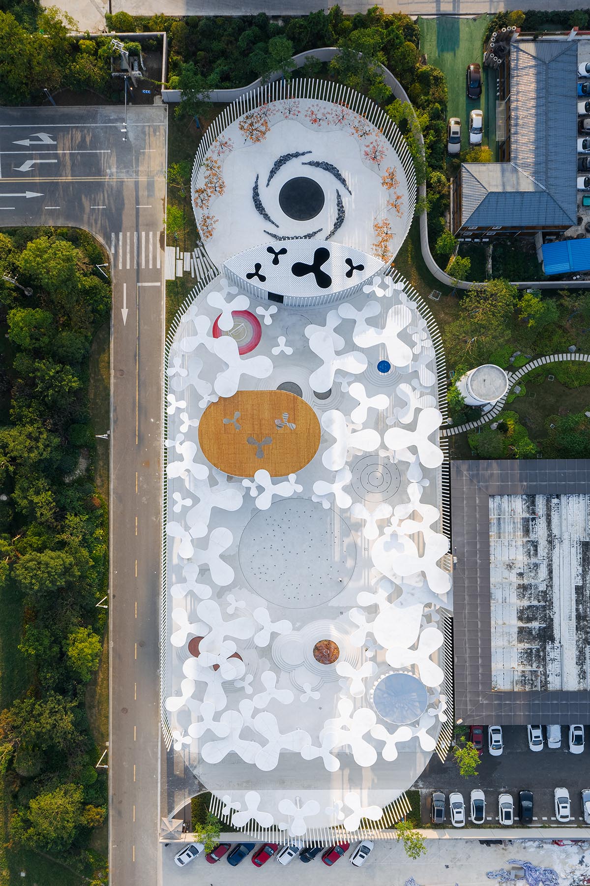Wutopia Lab creates surreal forest made of 108 white steel columns for sales center in Huzhou