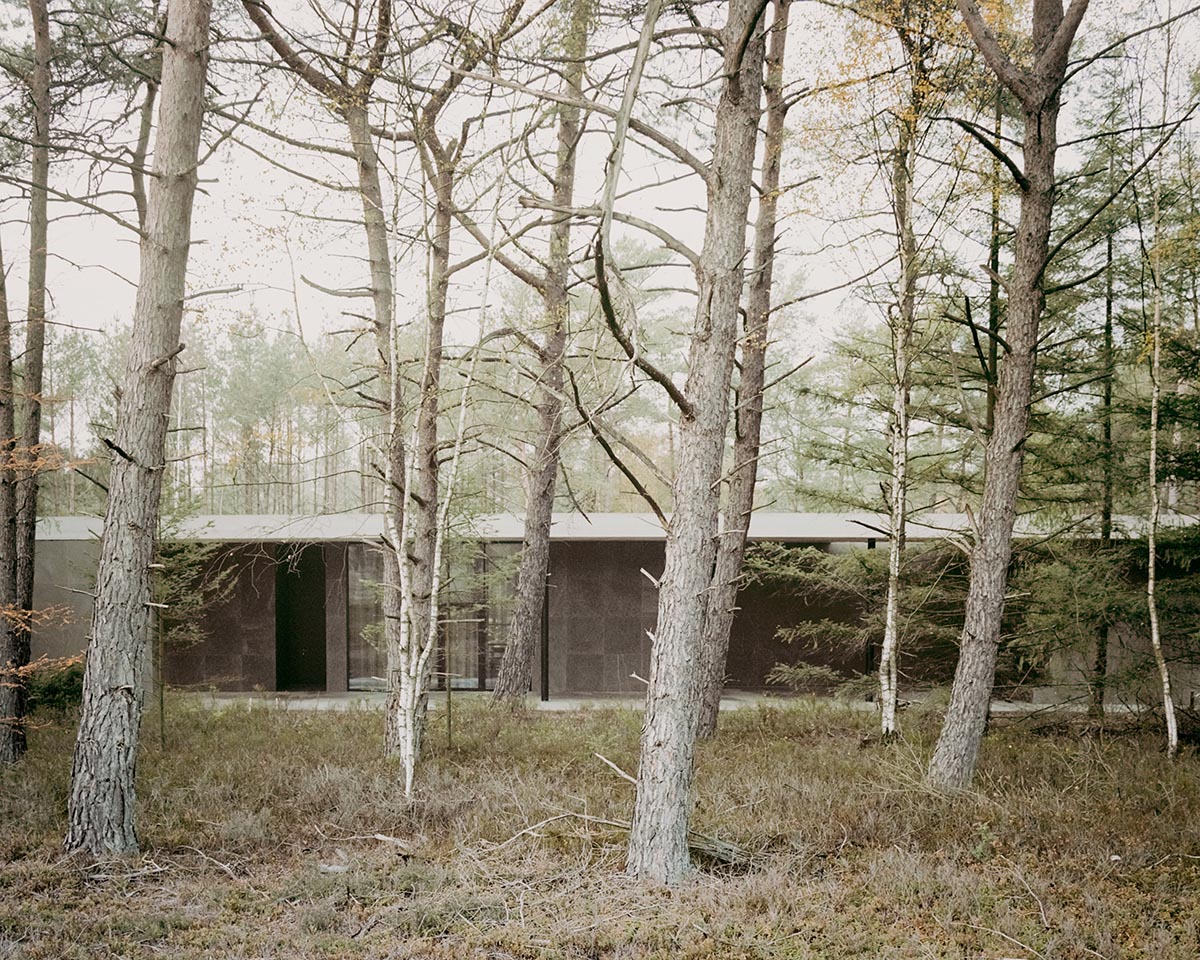 KAAN Architecten built serene Loenen Pavilion commemorating Dutch victims among pine trees