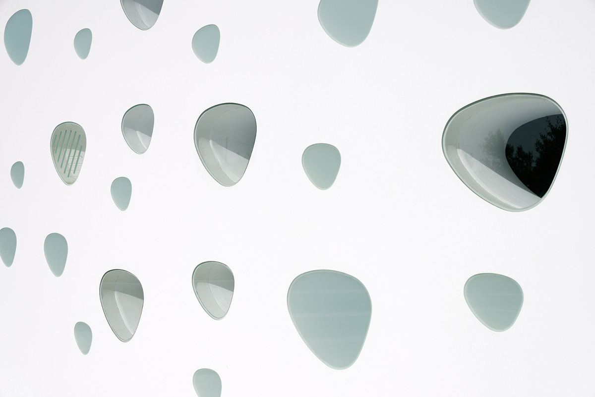 Ypsilon summer house embedded in landscape overlooking Peloponnese’s olive grove