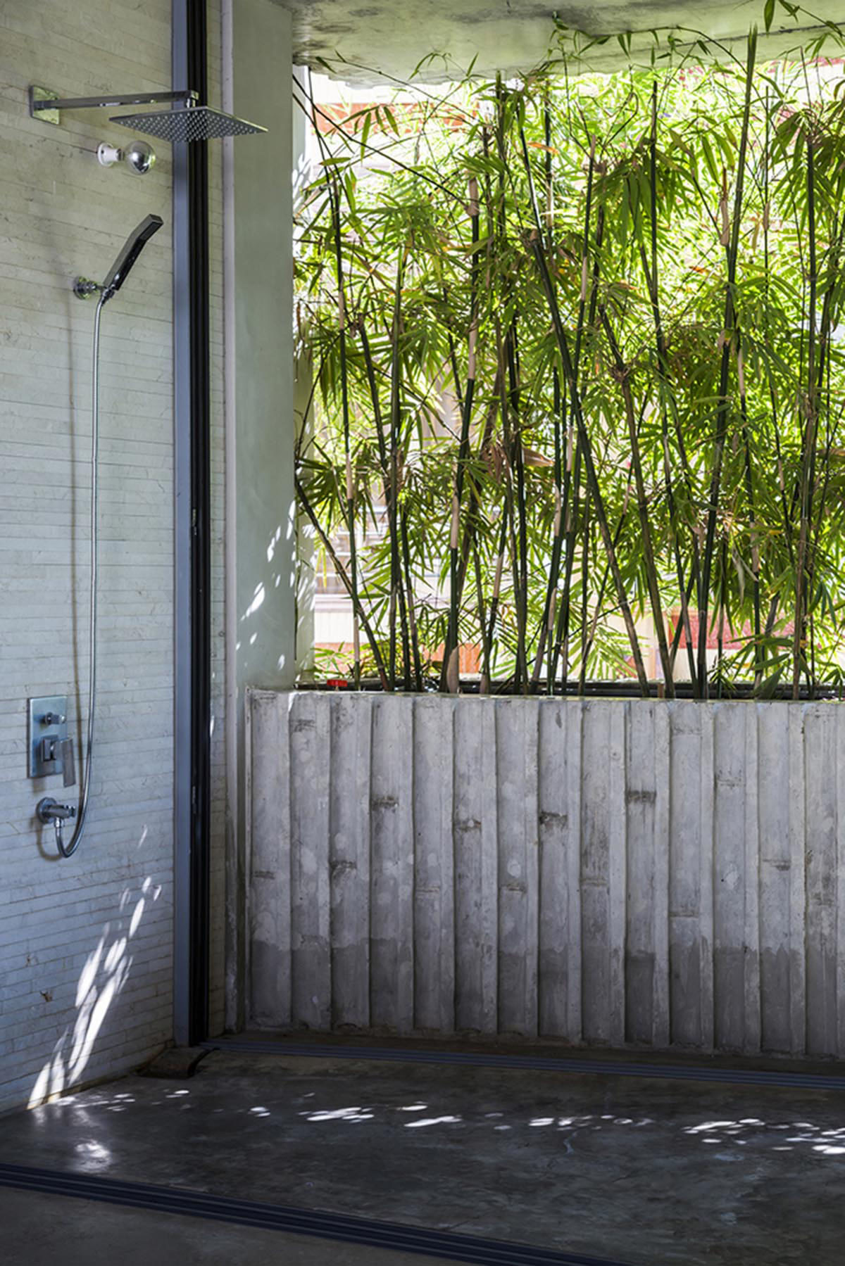 VTN Architects designs pop-up green facade for Bamboo House in a narrow site of Vietnam