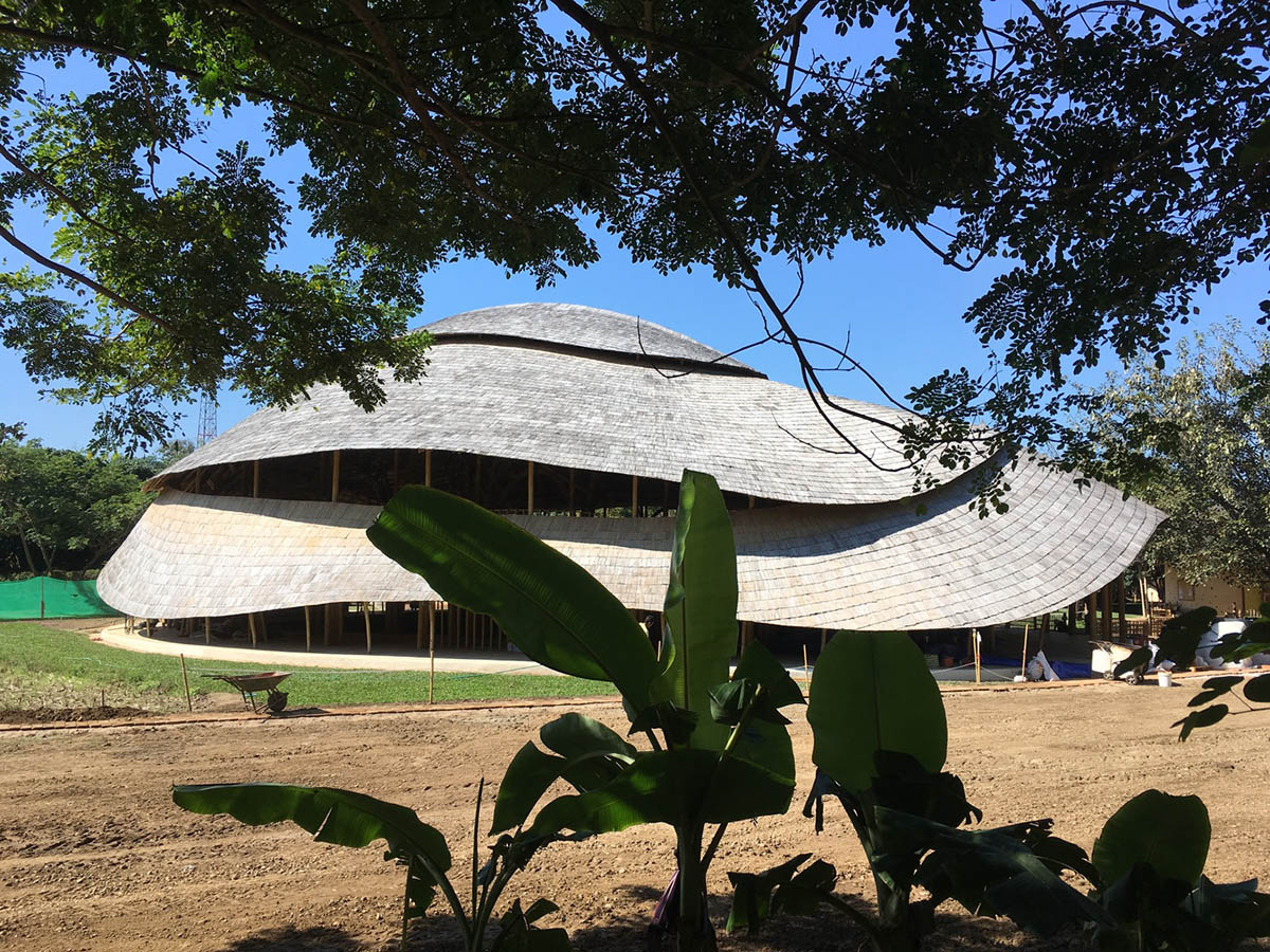 CLA used organic flowing curves with newly invented bamboo trusses for Bamboo Sports Hall in Thailand