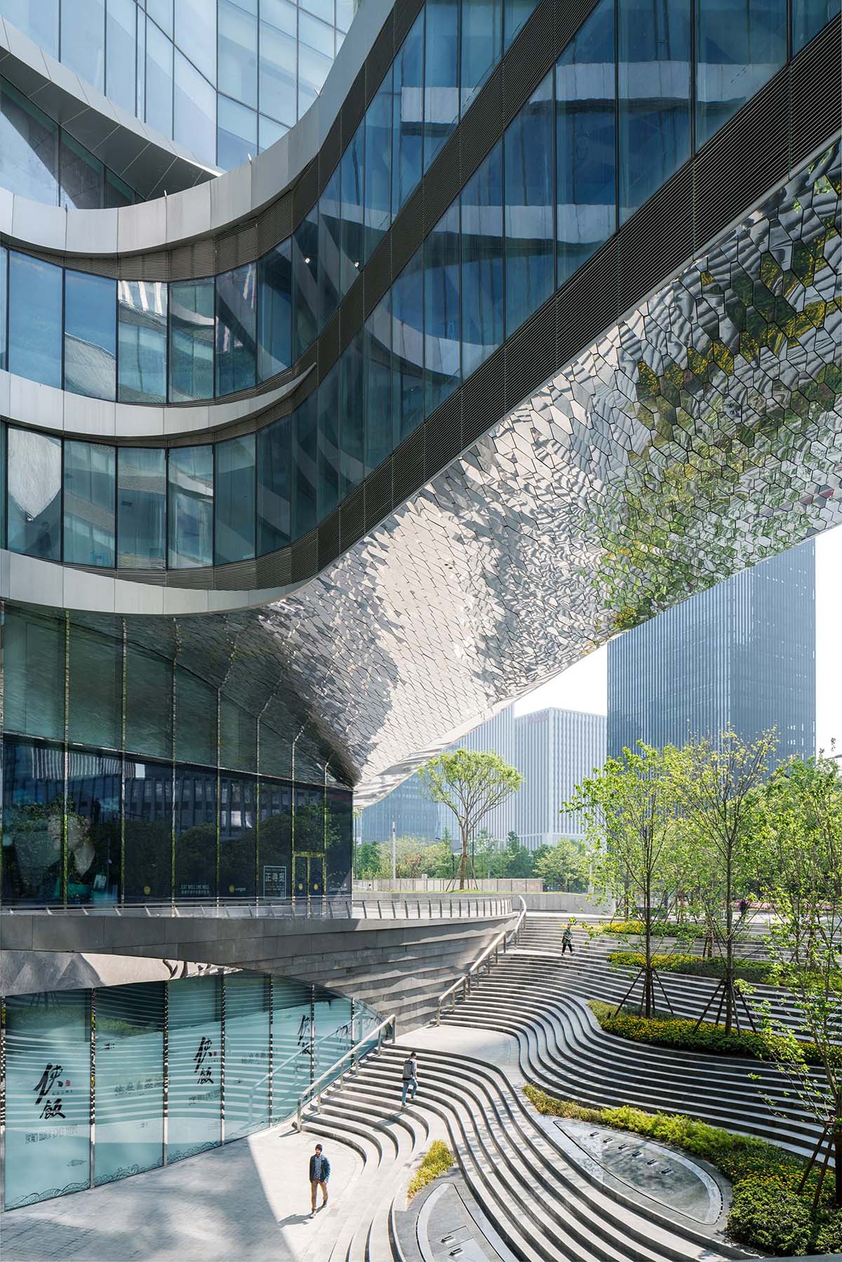 UNStudio completed Raffles City complex with twisted towers in Hangzhou