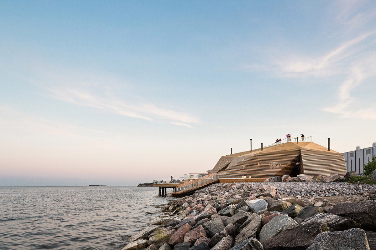 Avanto Architects creates stepped wooden public sauna on Helsinki seashore