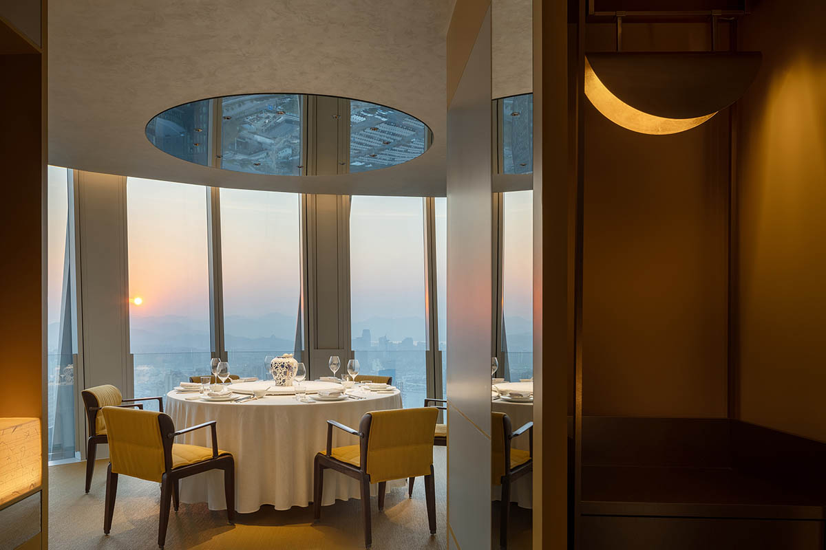 Nature Times Art Design completes restaurant with cave-like wall and garden-themed hall in Hangzhou