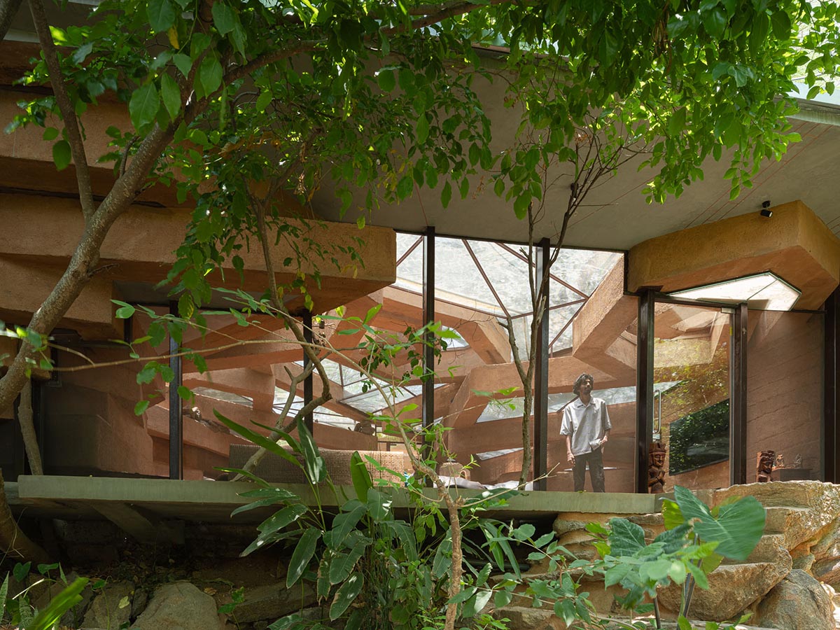 Wallmakers reveals snake house that forms a whirlpool on a steep hillside in India