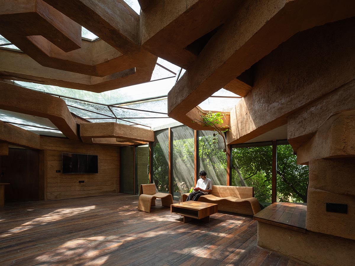 Wallmakers reveals snake house that forms a whirlpool on a steep hillside in India