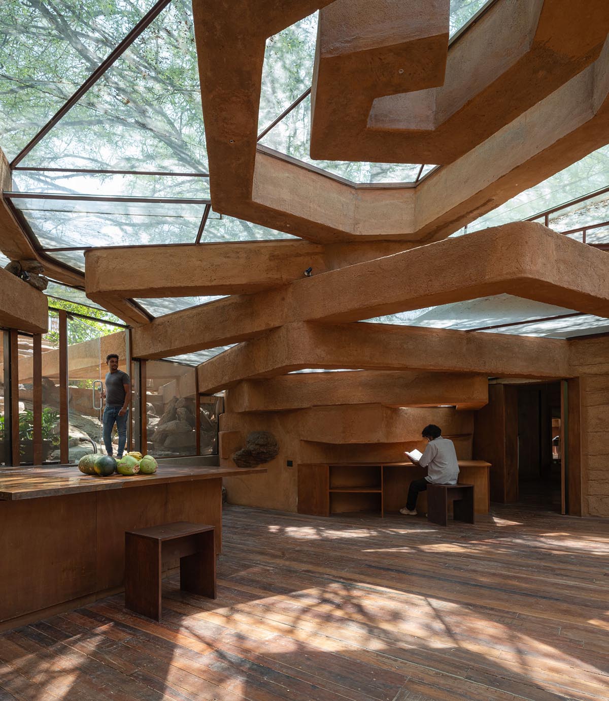 Wallmakers reveals snake house that forms a whirlpool on a steep hillside in India