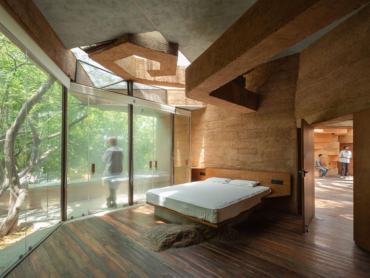 Wallmakers reveals snake house that forms a whirlpool on a steep hillside in India