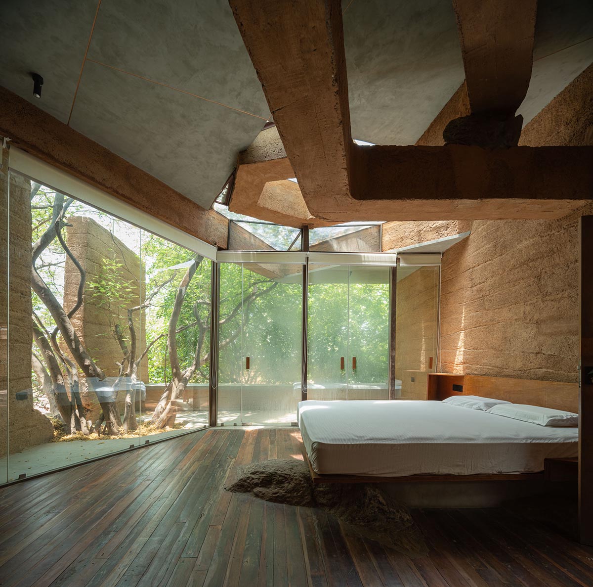 Wallmakers reveals snake house that forms a whirlpool on a steep hillside in India