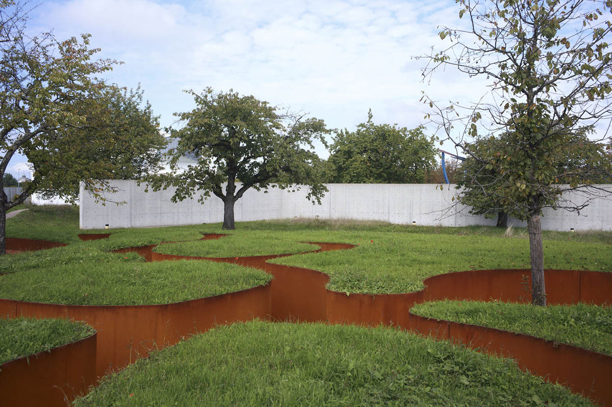 The snake-like Doshi Retreat becomes a sanctuary of sound and serenity at the Vitra Campus