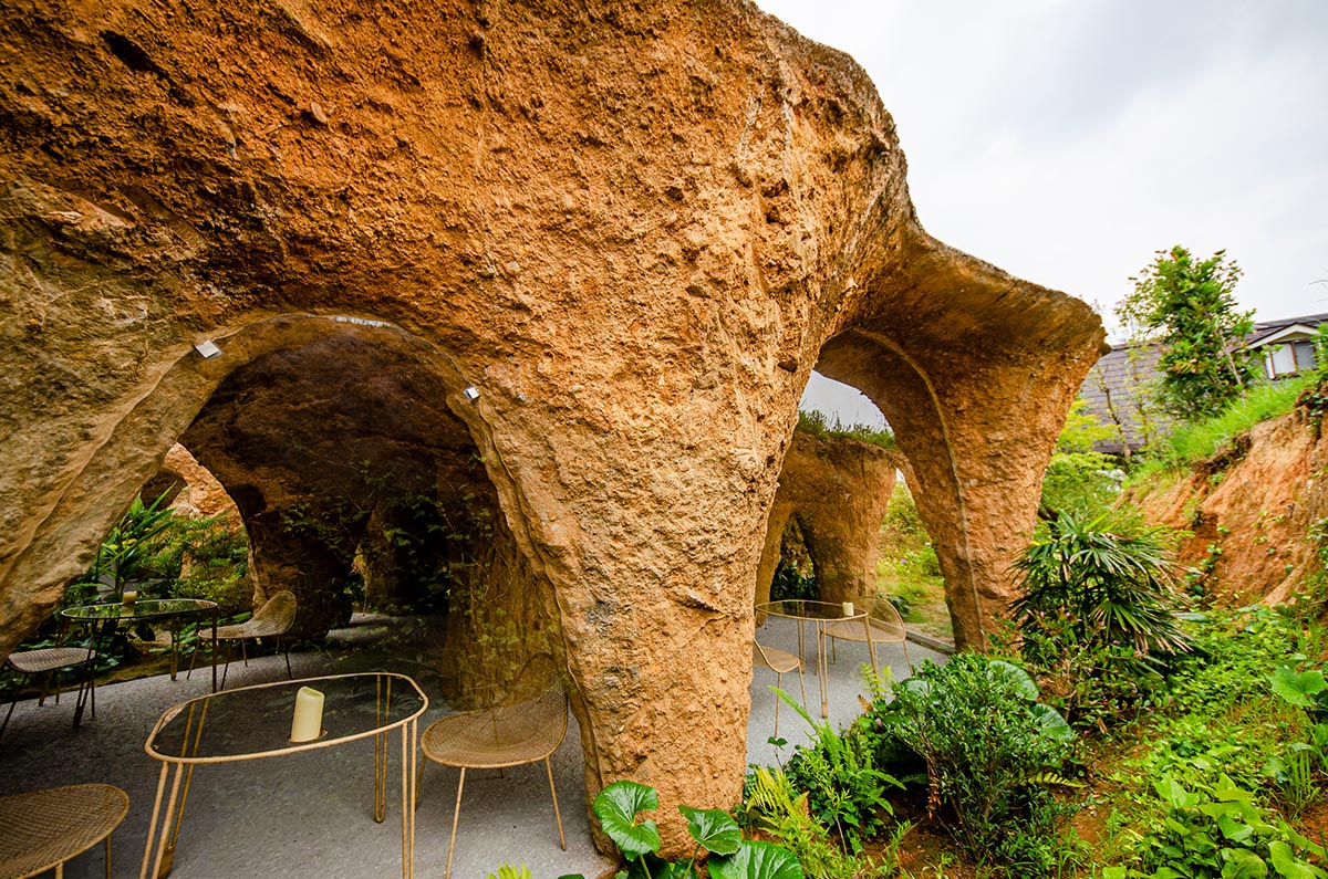 Junya.Ishigami+Associates reveals cave-like house and restaurant in earth form in Japan 