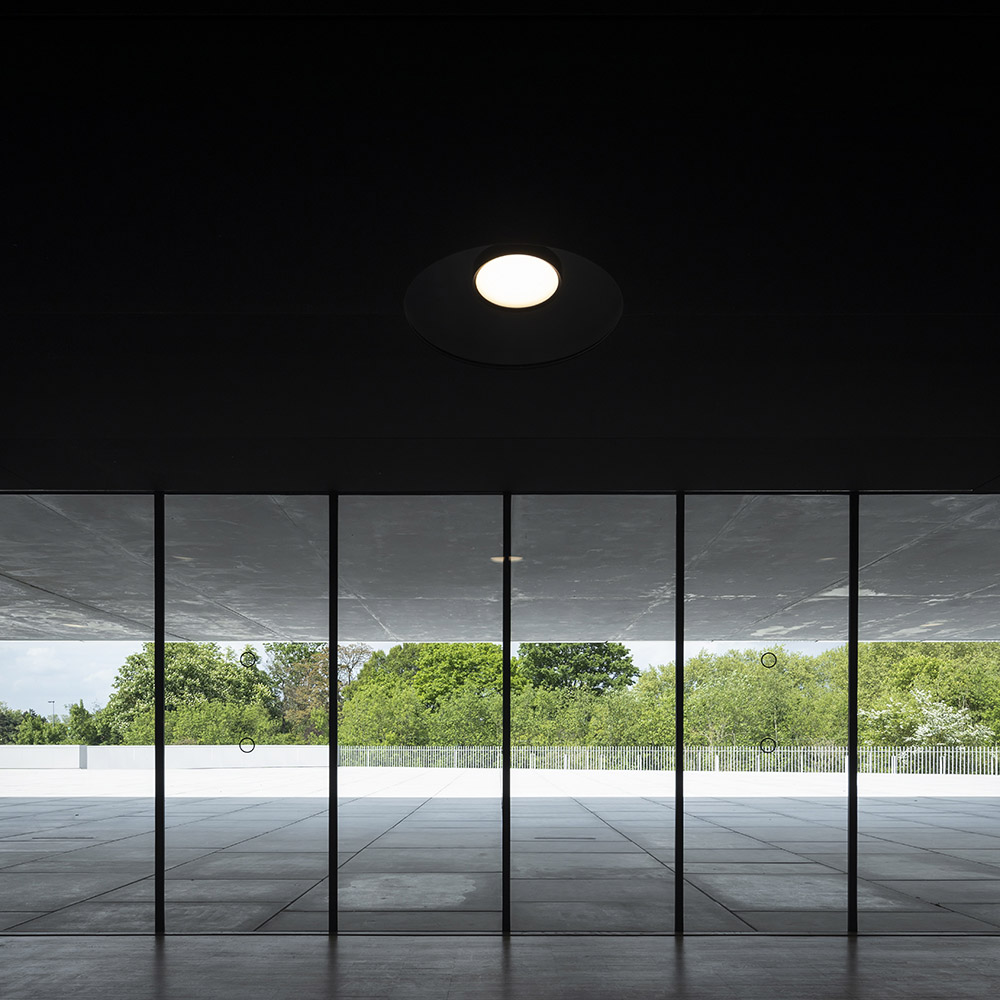 KAAN Architecten and PDAA built monolithic glazed CMA headquarters in Lille