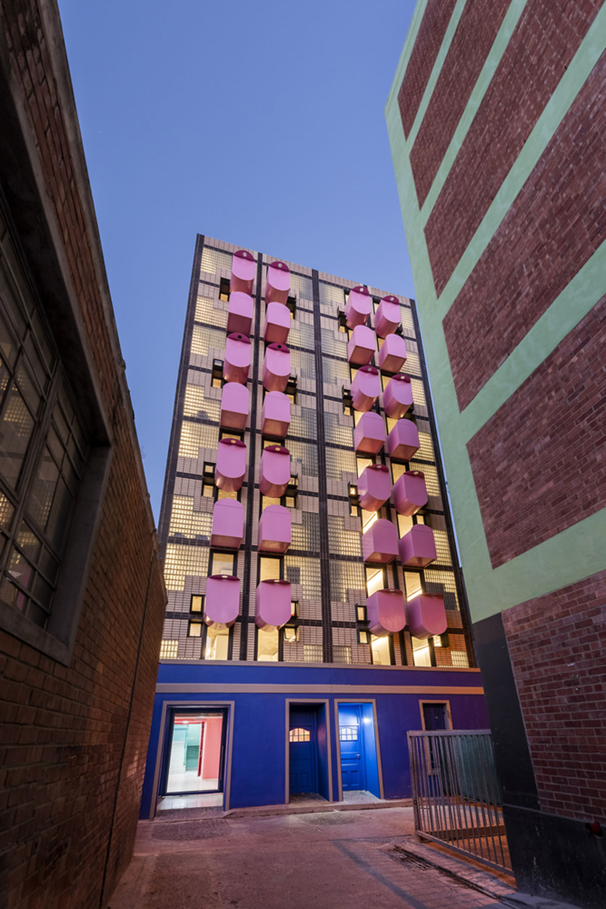 Two Five Five Architects adds protruding bright pink marshmallow balconies to apartment in Cape Town