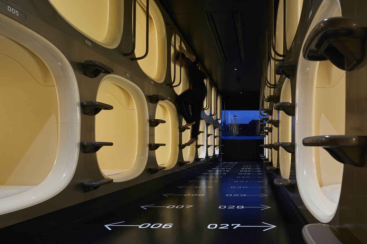 Naruse Inokuma Architects reinvents capsule hotel experience with more functionality in this hotel