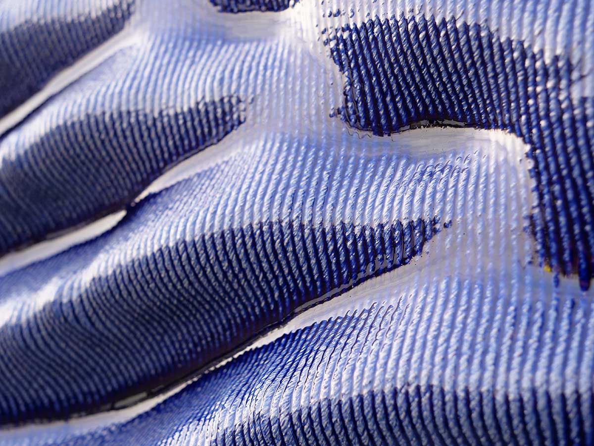 Studio RAP clads two gates of PoortMeesters residential building block in 3D blue porcelain