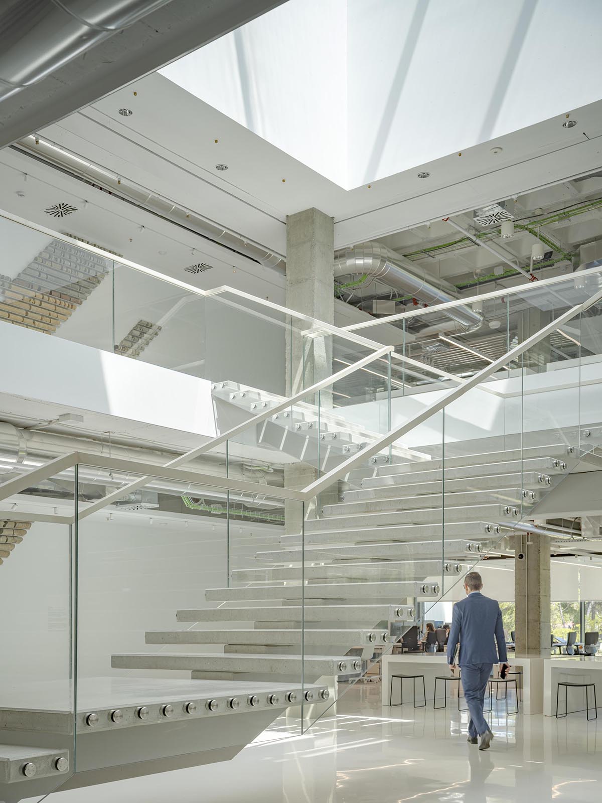 Perkins&Will converts former corporate complex into a people-focused workplace design in Madrid