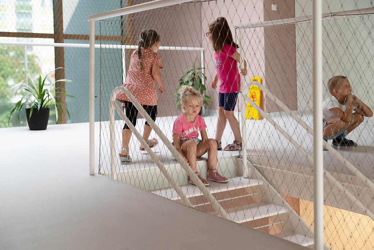 Archikon Architects reimagines Hungarian apartments into a vibrant pink kindergarten