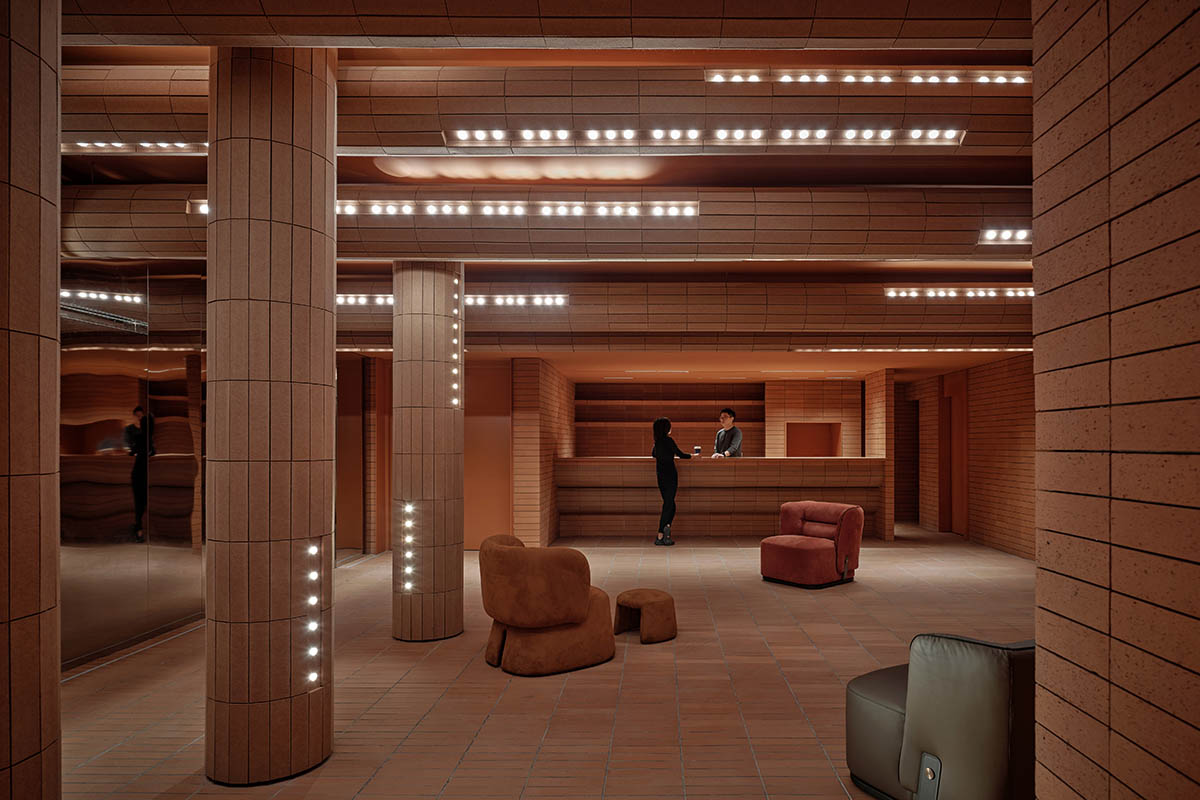 One Plus Partnership adds layered bricks to a cinema interior to resemble waves in Haikou