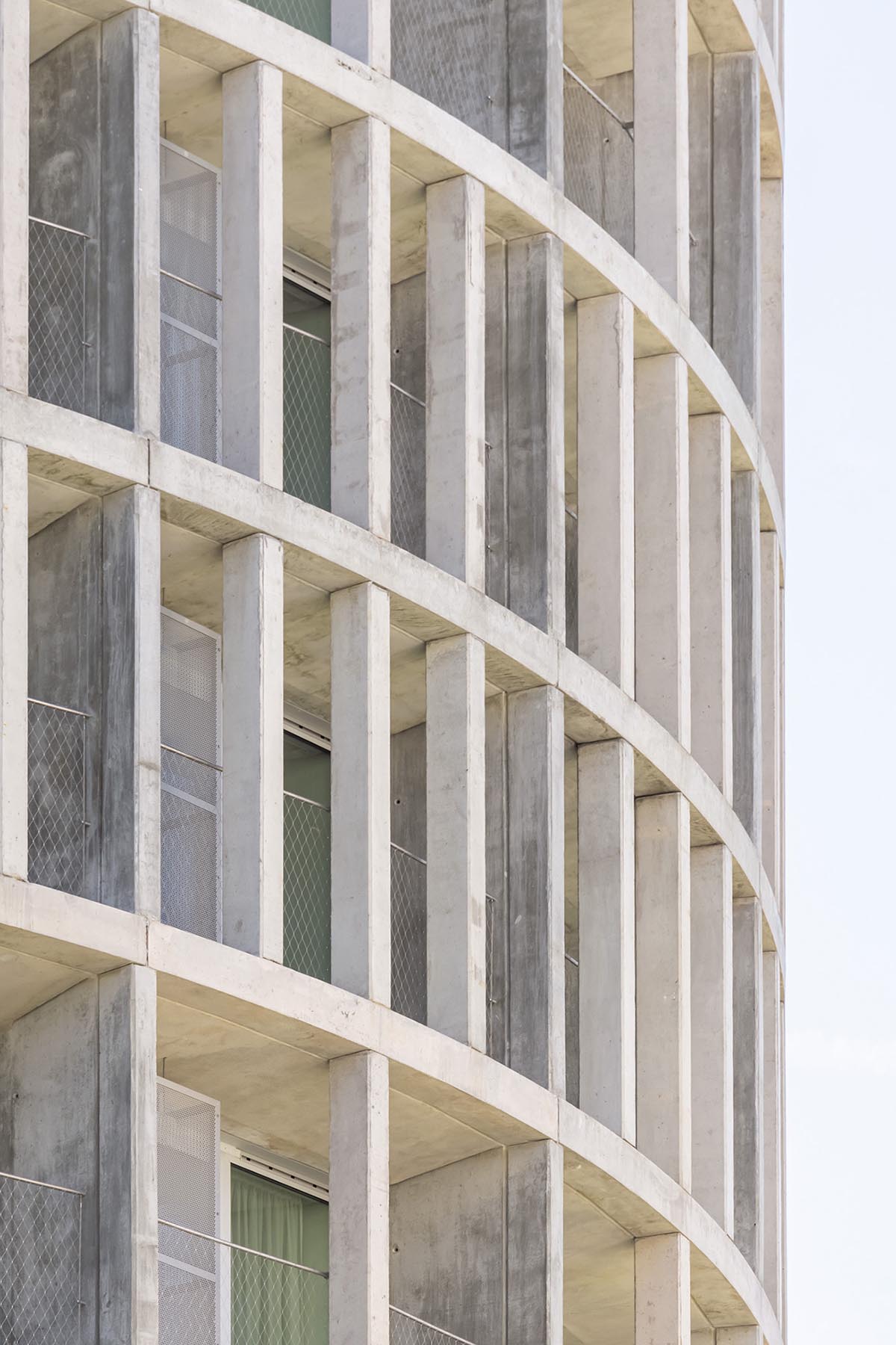 OODA completes cylindrical student housing with colonnaded skin in Porto, Portugal