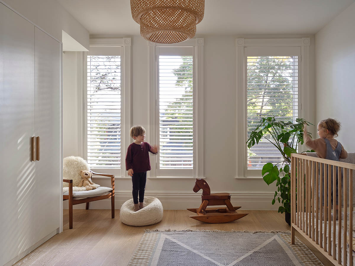 Reign Architects reimagines a historic 1850s Victorian home with open and warm interiors