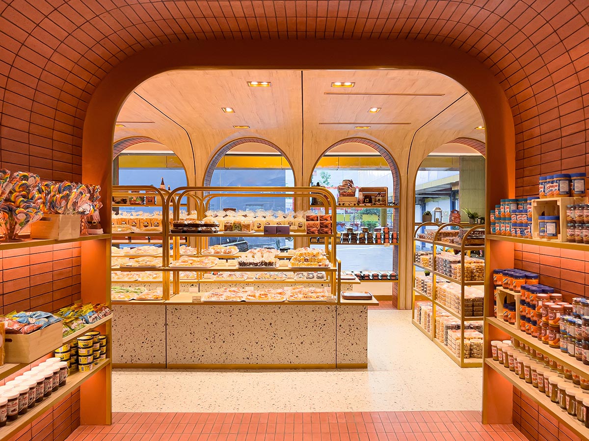Bakery interior mimics arches and portals with bright red bricks in Papua, Indonesia 