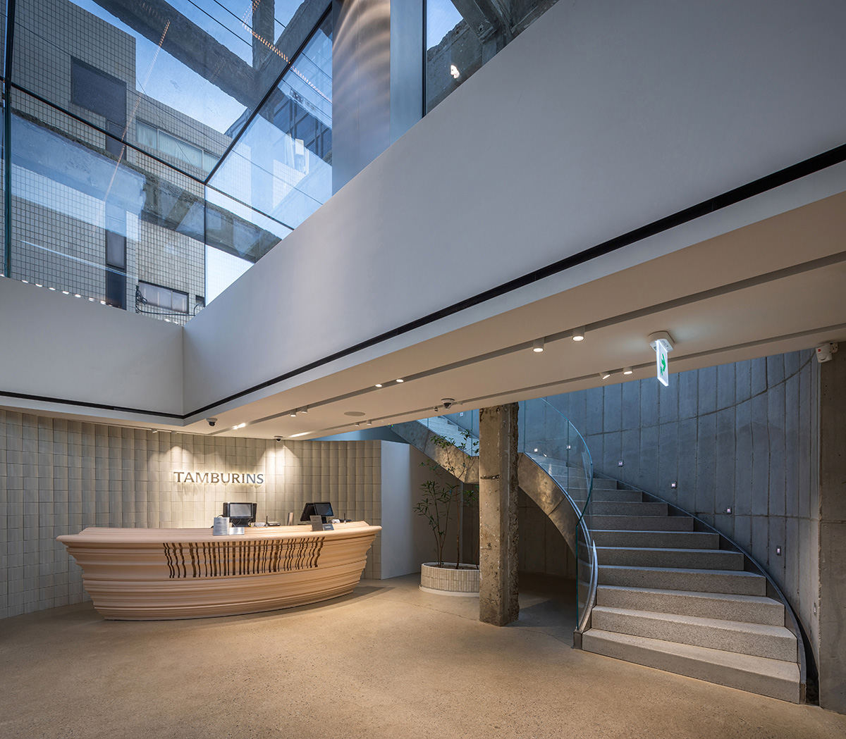 Perfume store by The System Lab shows the beauty of scent with gridded concrete and glass box