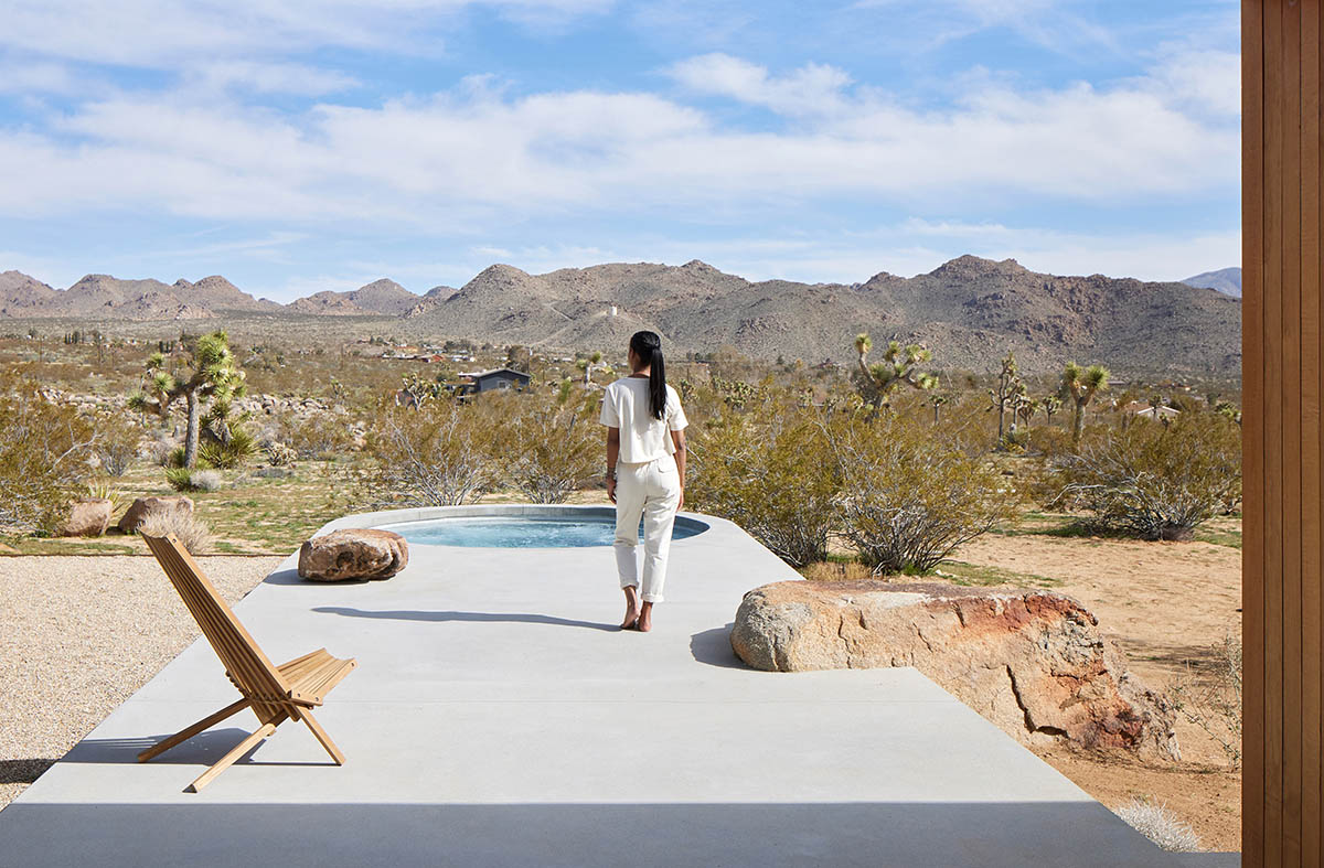 Industry of All Nations built a wooden pavilion in the rugged natural landscape of the Mojave Desert