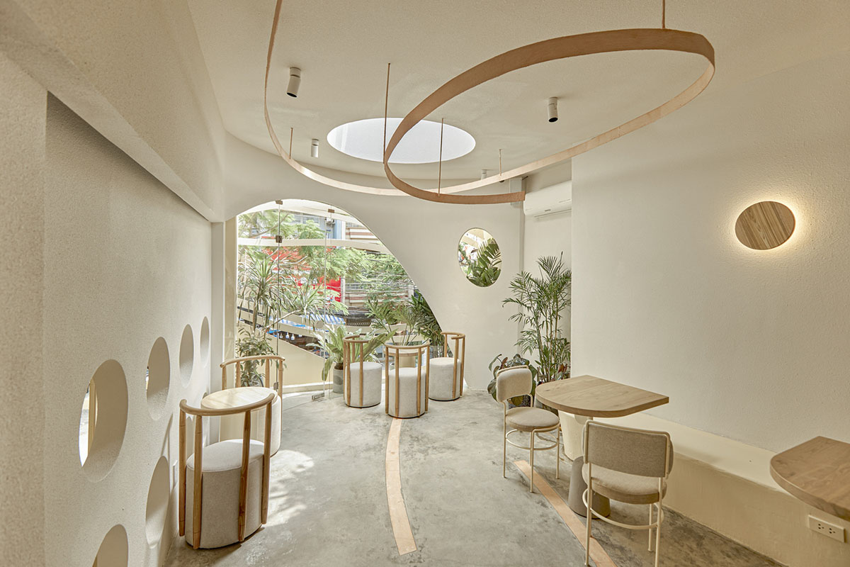 September Cafe is designed to look like a bird's nest with curved steel ...