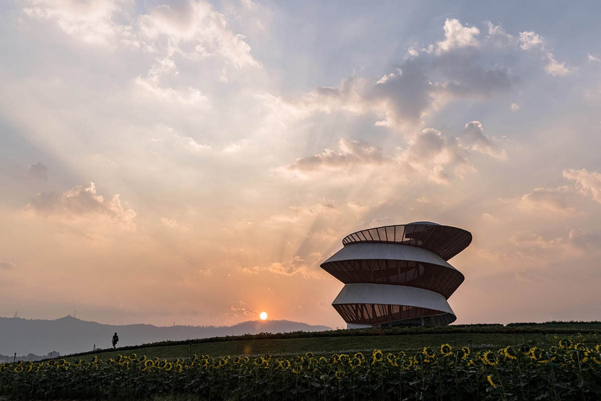 Doarchi designs spiral tower that allows visitors to explore the untouched nature while moving inside