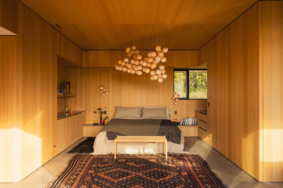 Omer Arbel shapes family home around monumental lily pad columns on a hayfield in Canada