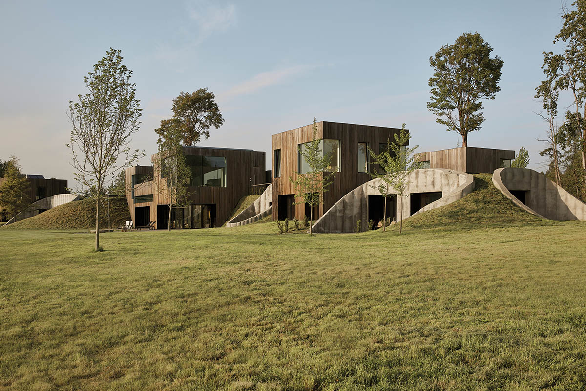 Omer Arbel shapes family home around monumental lily pad columns on a hayfield in Canada