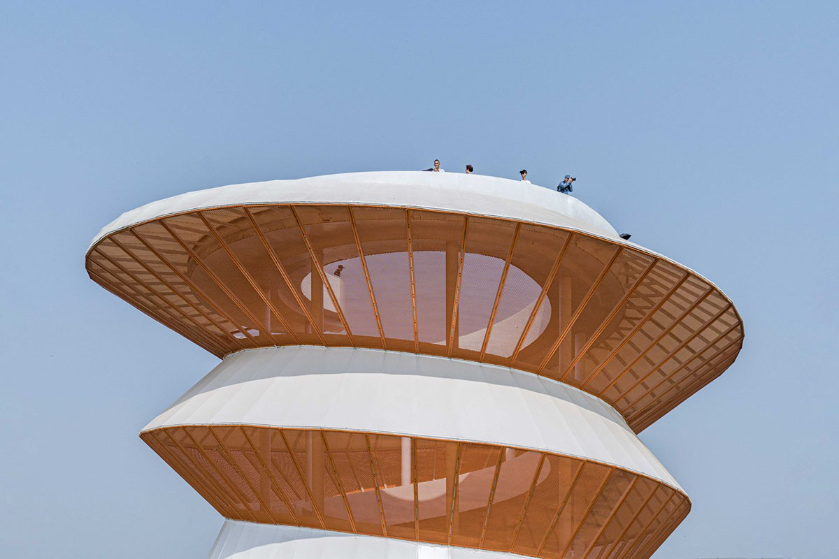 Doarchi designs spiral tower that allows visitors to explore the untouched nature while moving inside