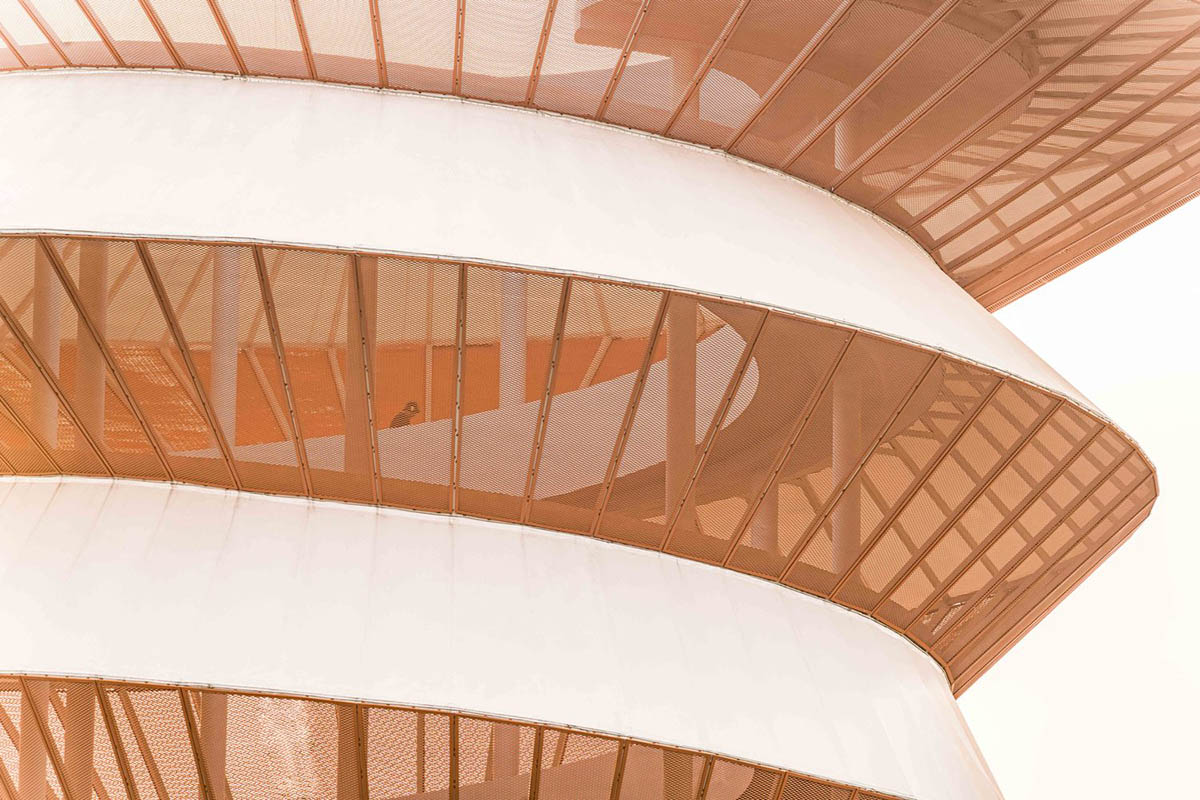 Doarchi designs spiral tower that allows visitors to explore the untouched nature while moving inside