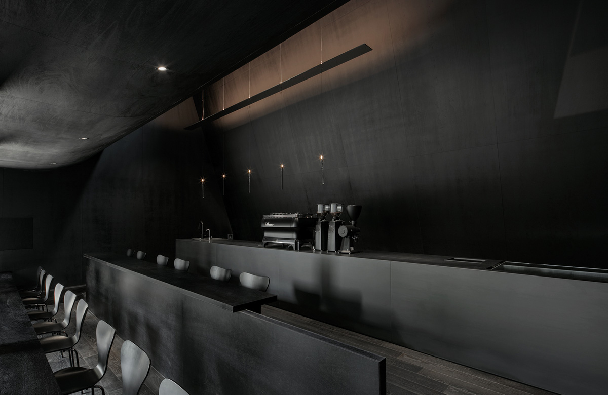 WGNB uses achromatic color of black for partly triangular-designed fashion store in Seoul