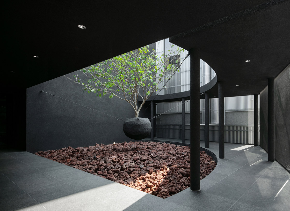 WGNB uses achromatic color of black for partly triangular-designed fashion store in Seoul