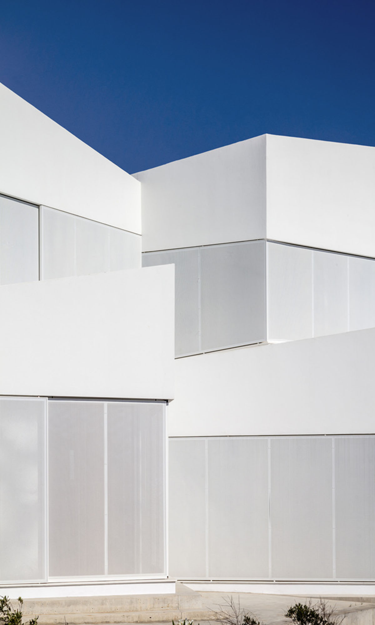 NOMO STUDIO designs holiday home comprised of bridge-like volumes on Minorca island