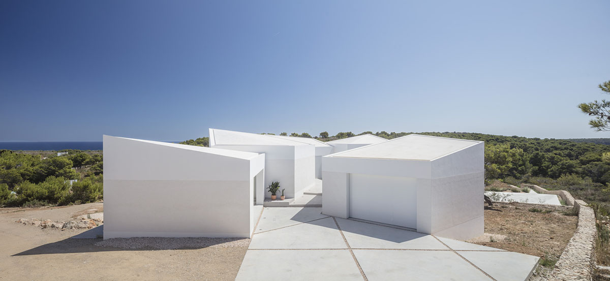 NOMO STUDIO designs holiday home comprised of bridge-like volumes on Minorca island