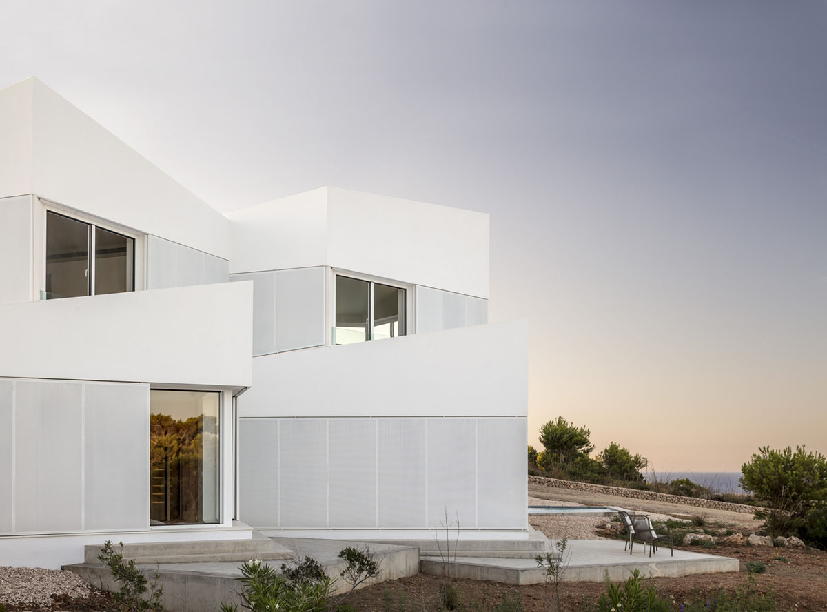 NOMO STUDIO designs holiday home comprised of bridge-like volumes on Minorca island