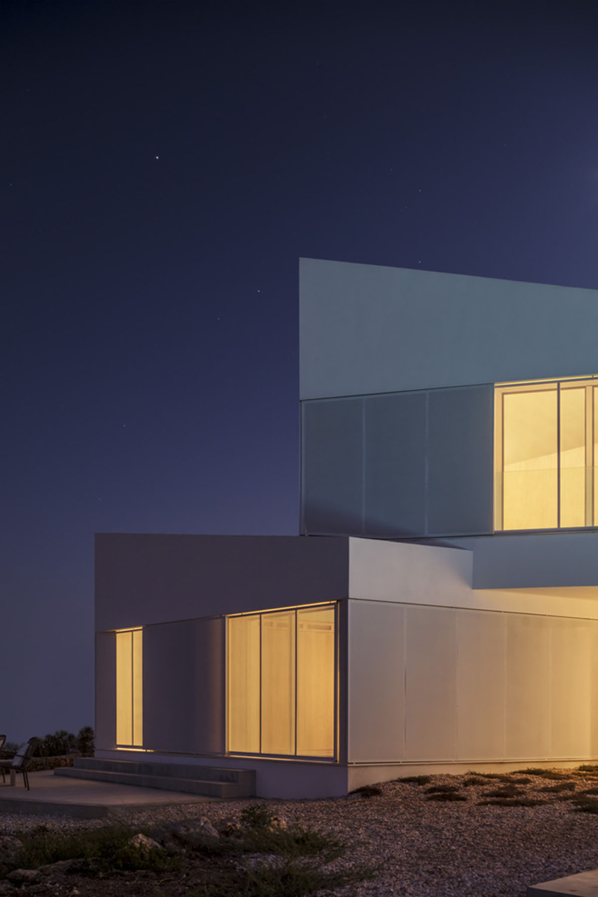 NOMO STUDIO designs holiday home comprised of bridge-like volumes on Minorca island