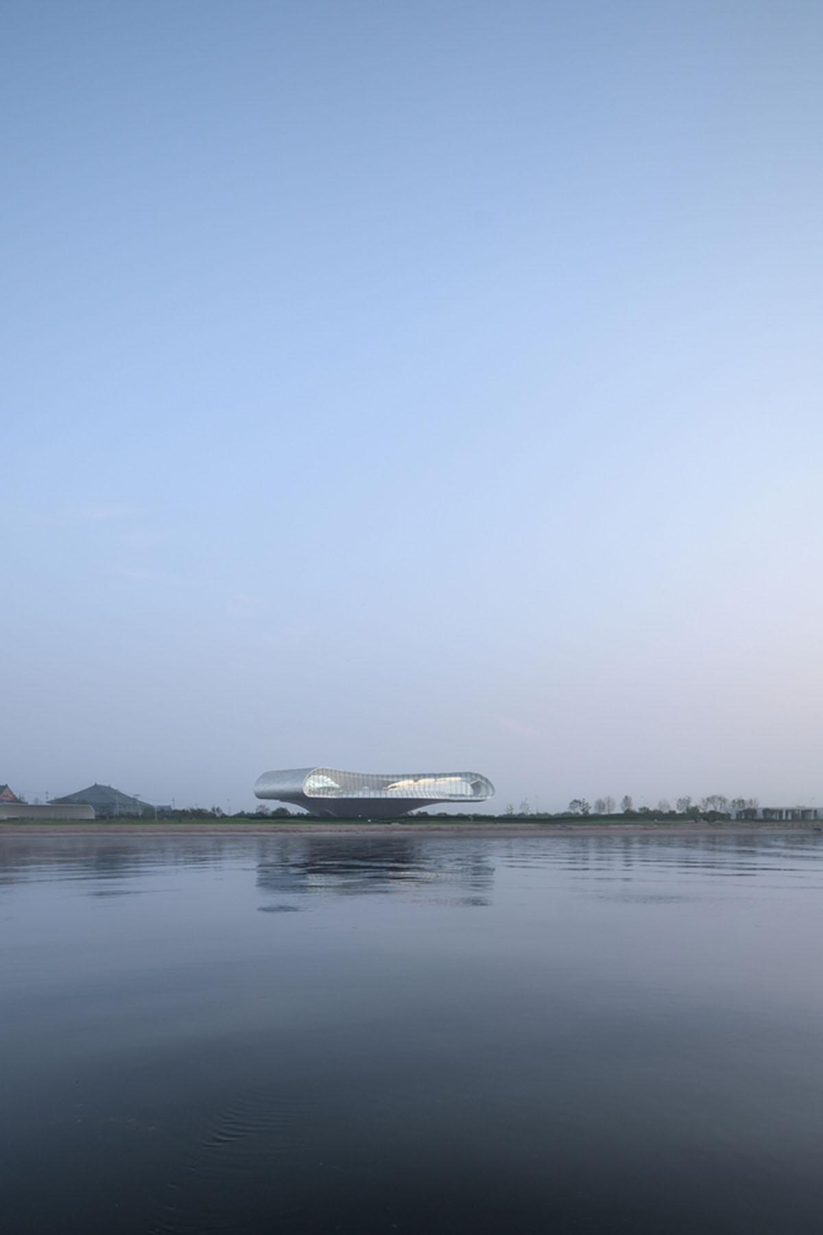 Lacime Architects creates wavy and floating Shimao-The Wave Showroom in Tianjin, China