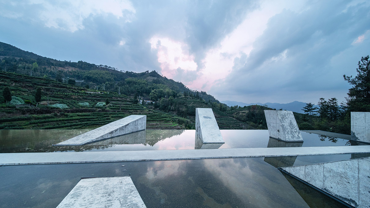 Eight diagonal light tubes are protruding from tea house to grasp prolonged sunlight hours by DnA