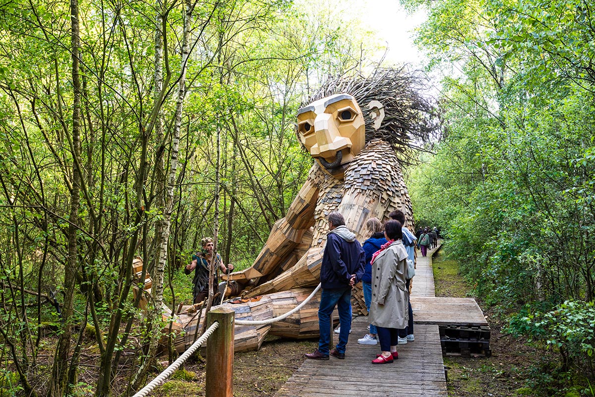 Danish recycling artist Thomas Dambo installed 7 giant wooden trolls in Boom, Belgium