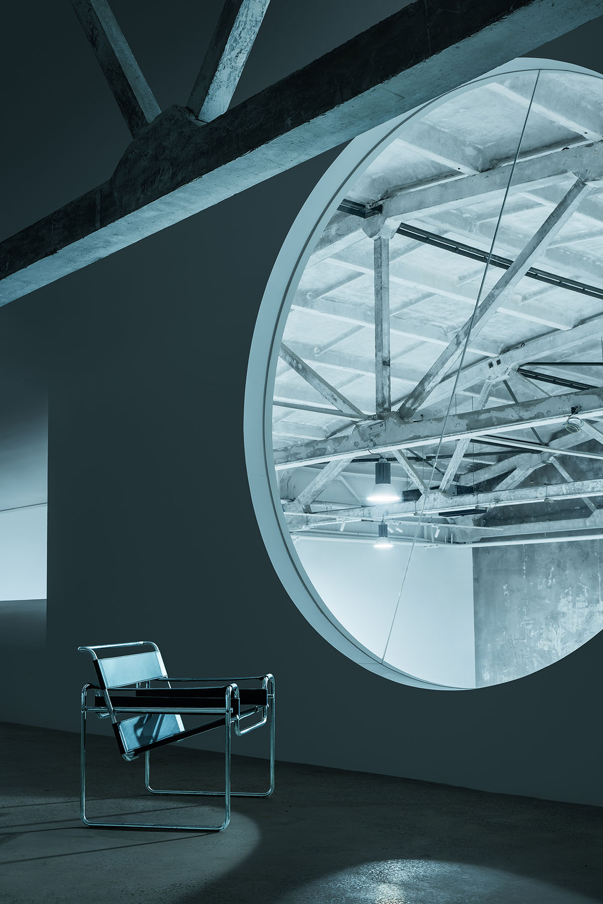 CUN converts old warehouse into a photographer's studio with industrial-looking interior in Beijing