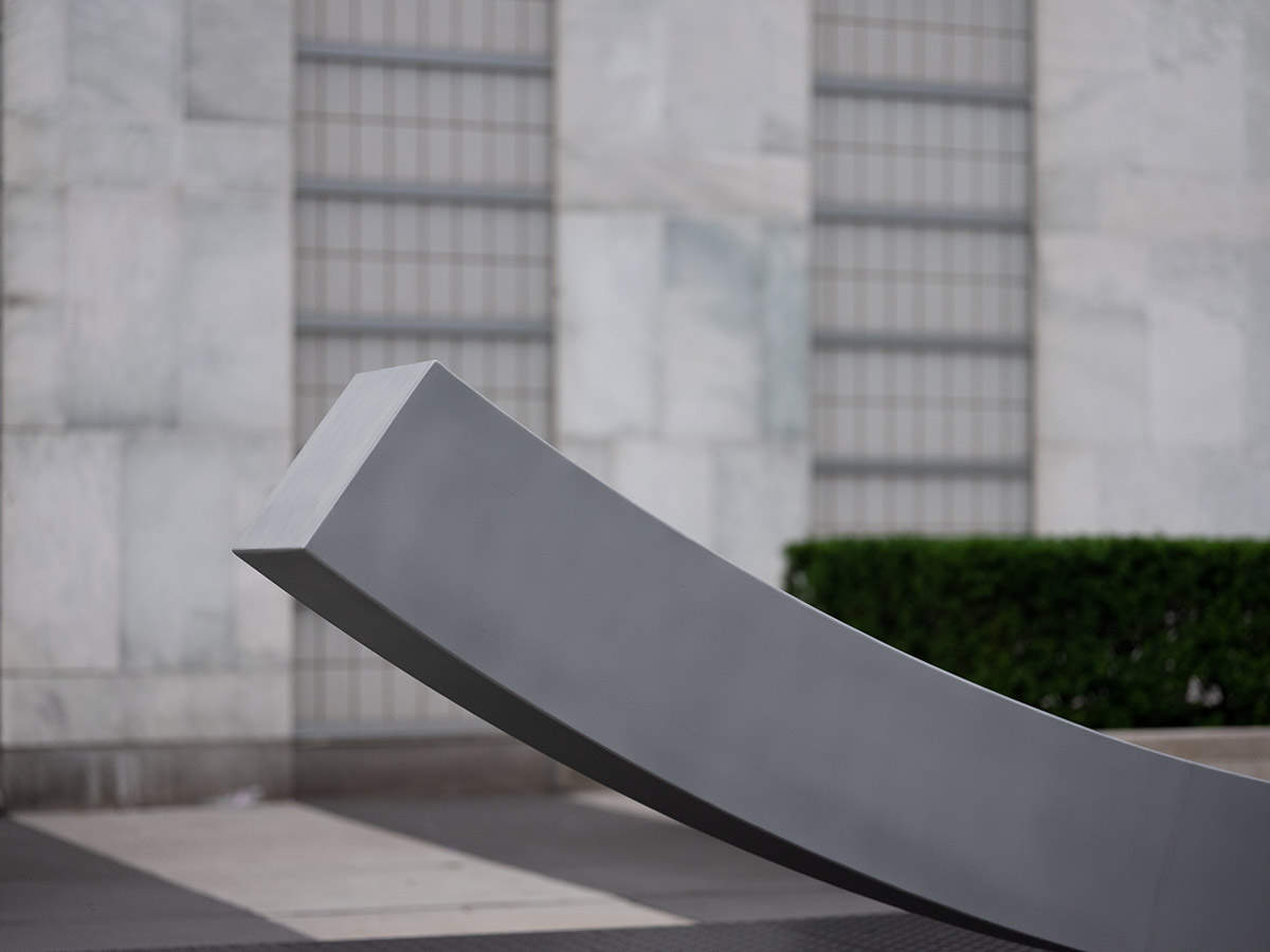 Snøhetta designed arc-shaped urban peace bench for the UN Headquarters Plaza in New York City