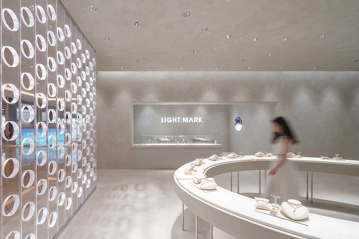 kooo architects adds transparent floating halos as a screen to jewelry store in Suzhou 