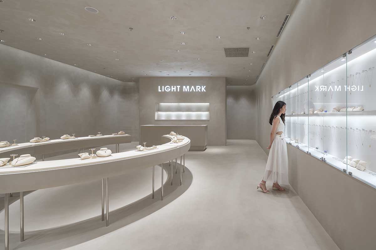 kooo architects adds transparent floating halos as a screen to jewelry store in Suzhou 